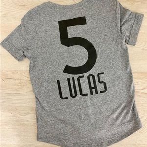 Kids age & name with super hero on front sleeve